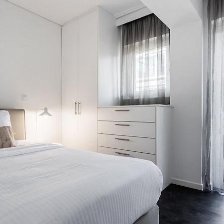 Onezerotwo By Zoia Living Aparthotel Athena Bagian luar foto